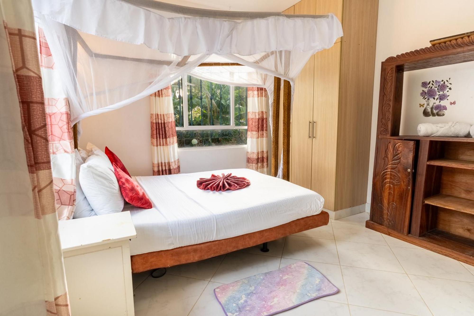 Queens Chateau Boutique Villa Diani Beach Extérieur photo