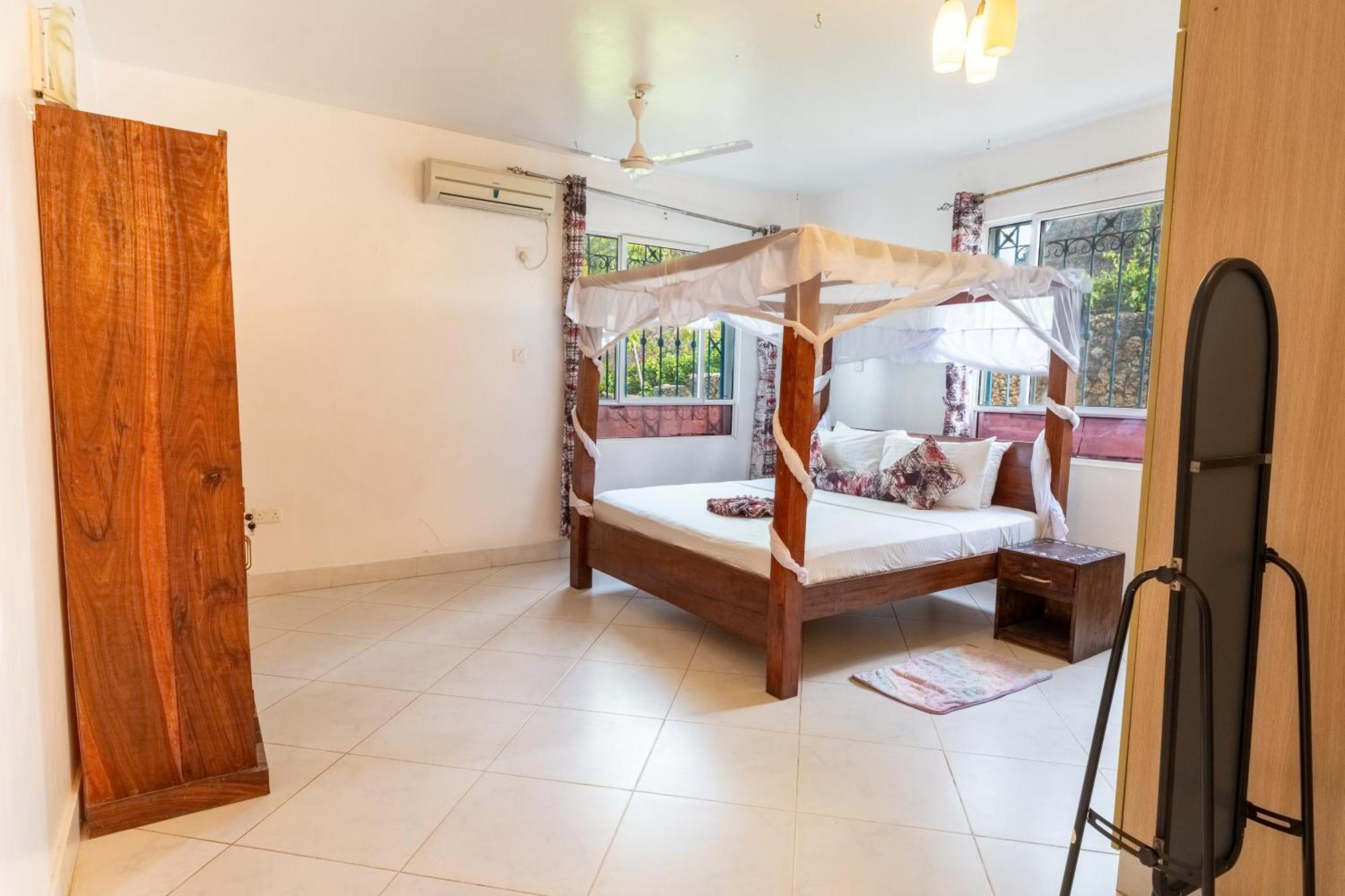 Queens Chateau Boutique Villa Diani Beach Extérieur photo