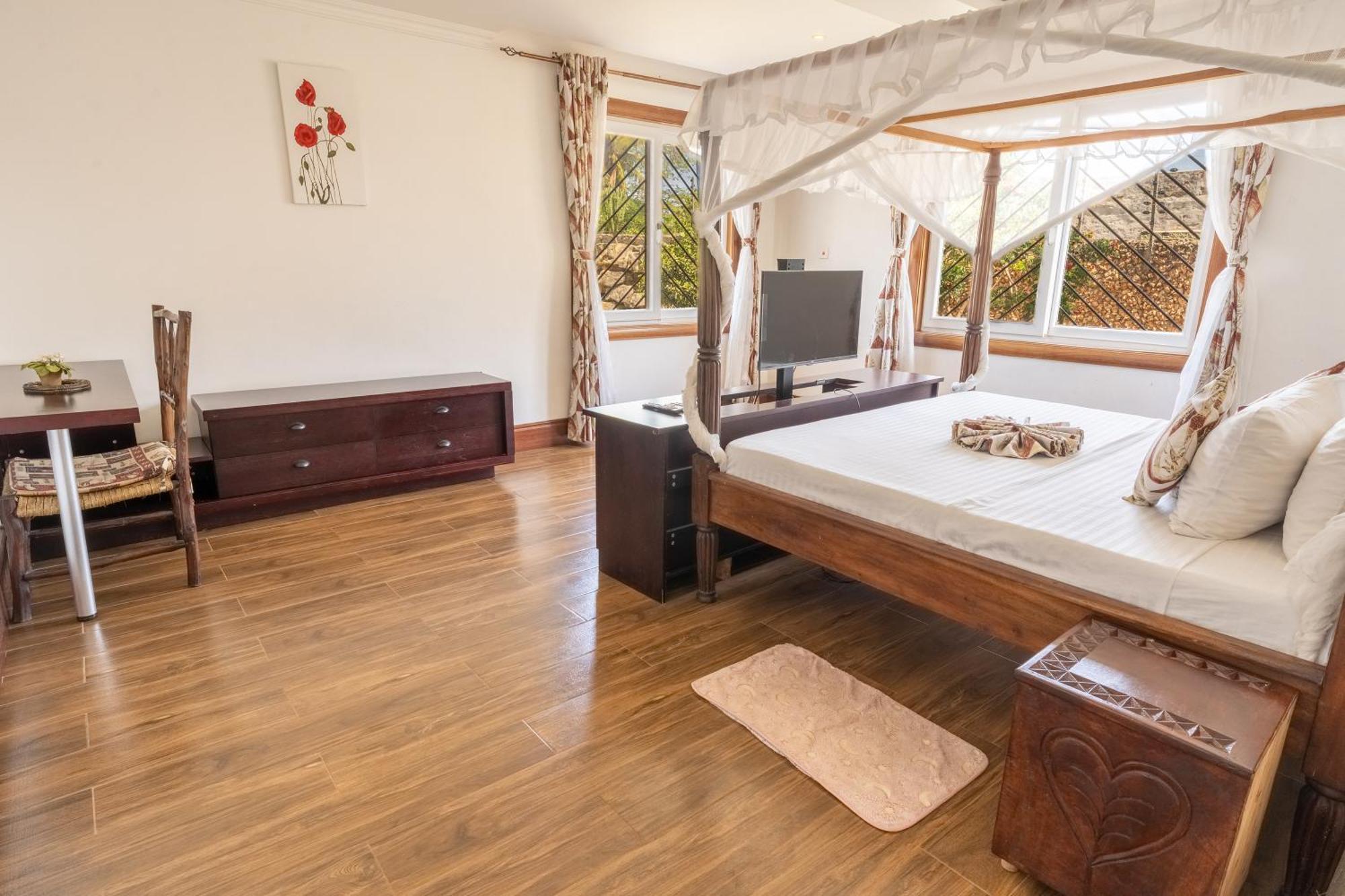 Queens Chateau Boutique Villa Diani Beach Extérieur photo