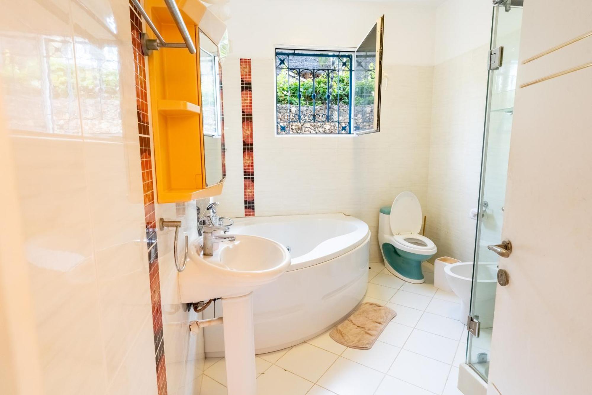 Queens Chateau Boutique Villa Diani Beach Extérieur photo